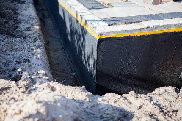 Professional Basement Waterproofing technician working in Willernie, MN